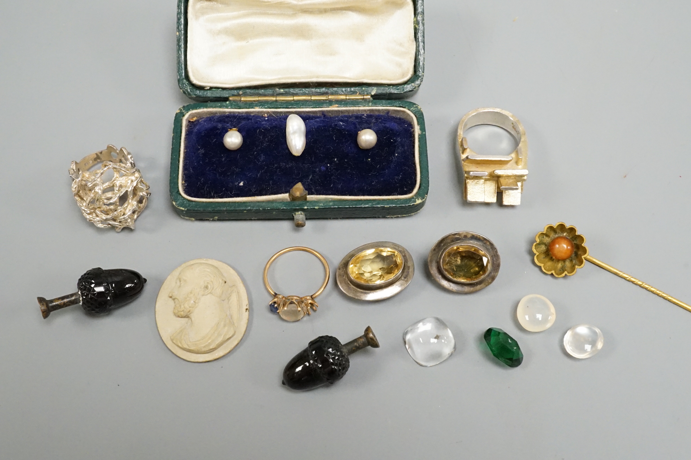 A small group of jewellery and curios including a Scandinavian sterling modernist ring, one other white metal modern ring, a lava cameo dress stud set etc.